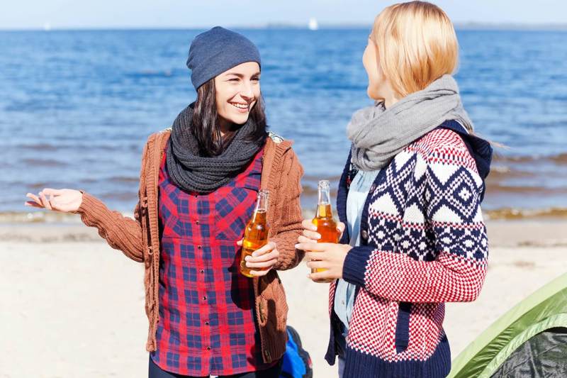 Two Women Enjoying Themselves While Drinking Non Alcoholic Beer.jpg