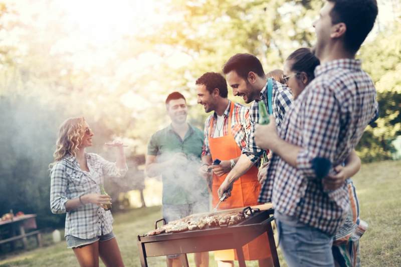 Group Of Friends At A Barbecue Having Non Alcoholic Drinks And Food (2).jpg